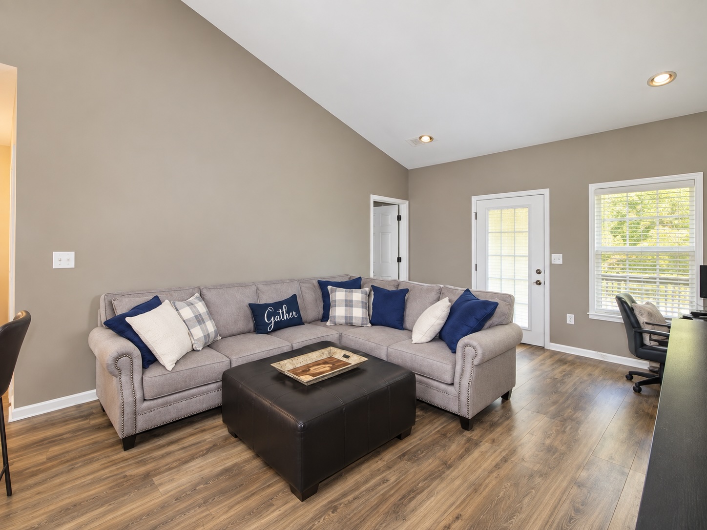 Bright living room with high ceilings